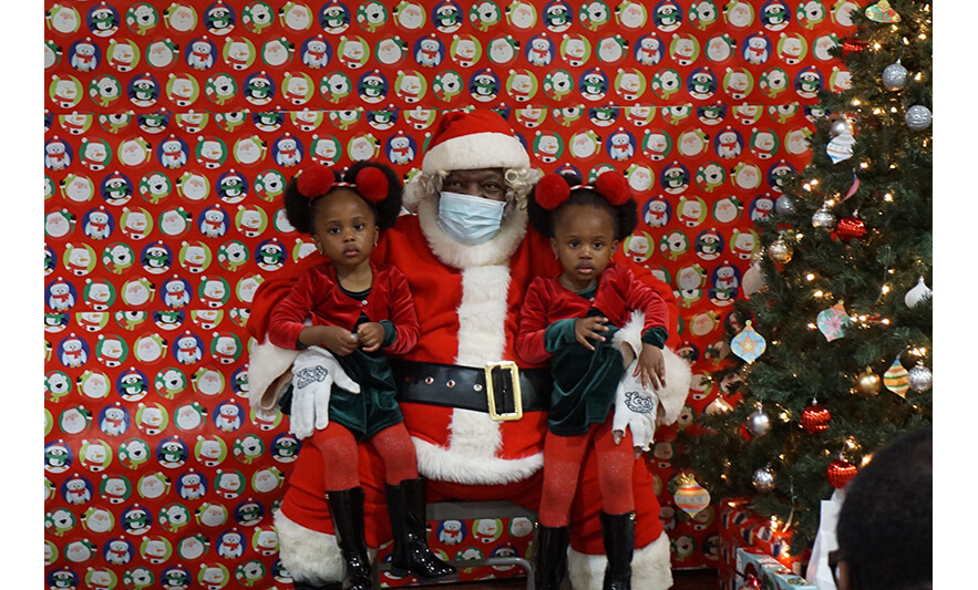 Breakfast with Santa 12-17-2022 Pair in pigtails with Santa for web