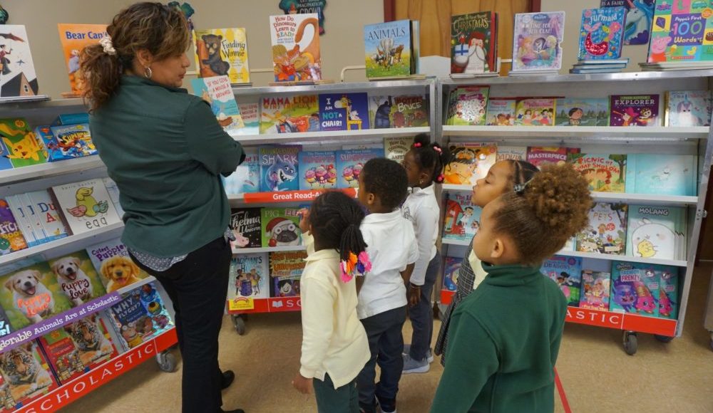 CHELC Book Fair Teacher Showing Book CHELC Book Fair Teacher Showing Book
