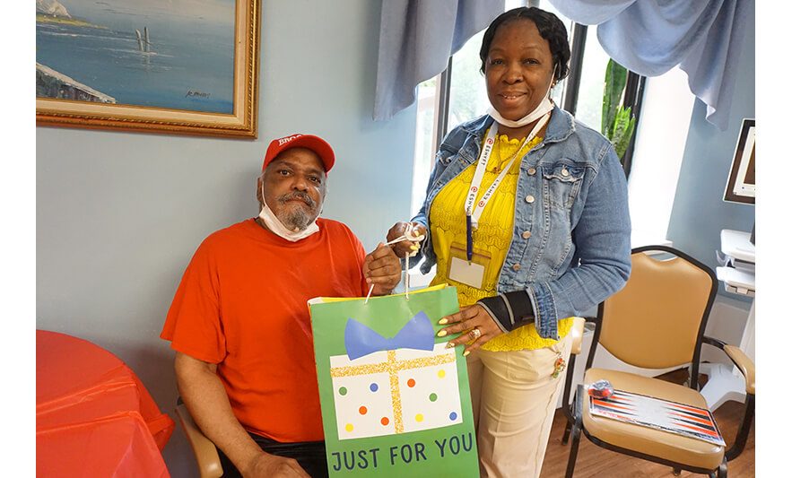 Extended Care Adopt-a-Resident Day 5-15-2024 Yonette Semple with man in red for web