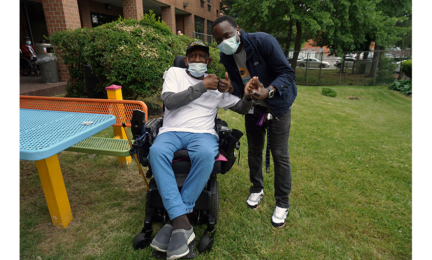 Extended Care Cookout 5-19-2023 Resident with staff member for web