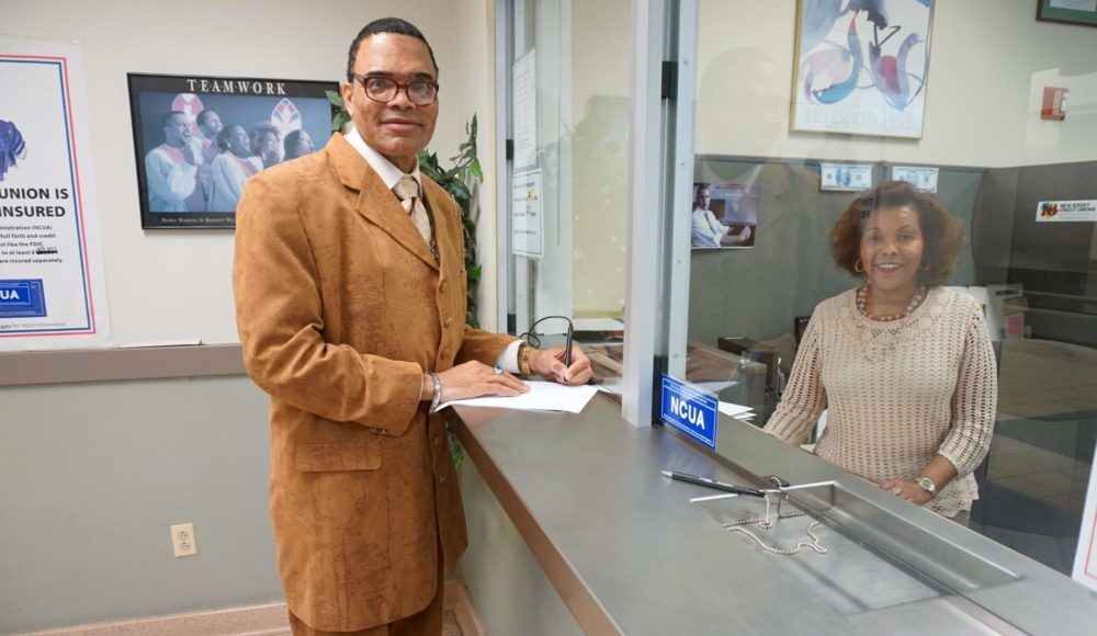 Miles Callender and Mulu Gebreyesus at Credit Union Miles Callender and Mulu Gebreyesus at Credit Union