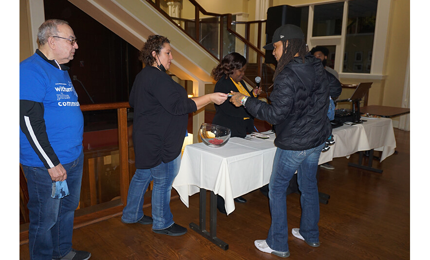 Withum Harmony House Thanksgiving Dinner 11-21-2022 Woman getting gift card for web